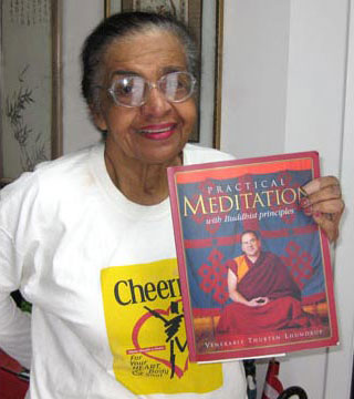 Mom and the book she gave me for Christmas that made me a Buddhist